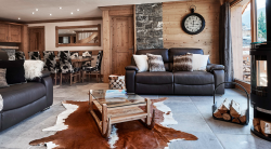Living room with Stove in Chalet Chamois in Meribel
