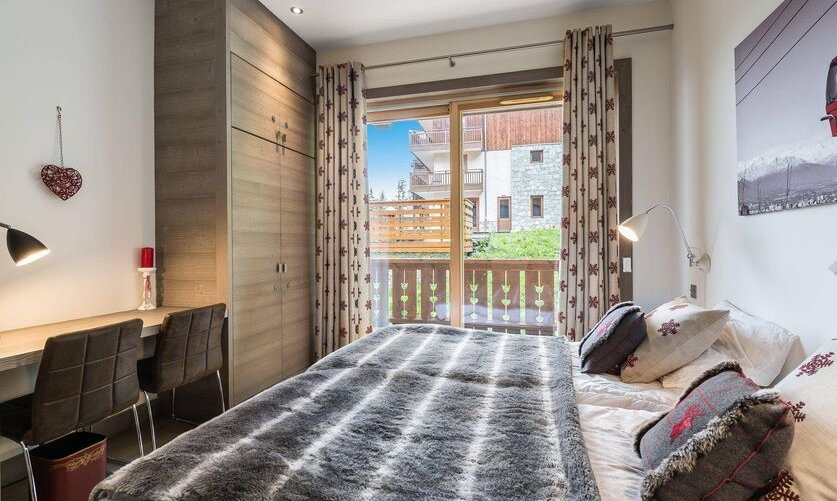 One of the comfortable Bedrooms in Apartment Aspen Lodge 11 Meribel