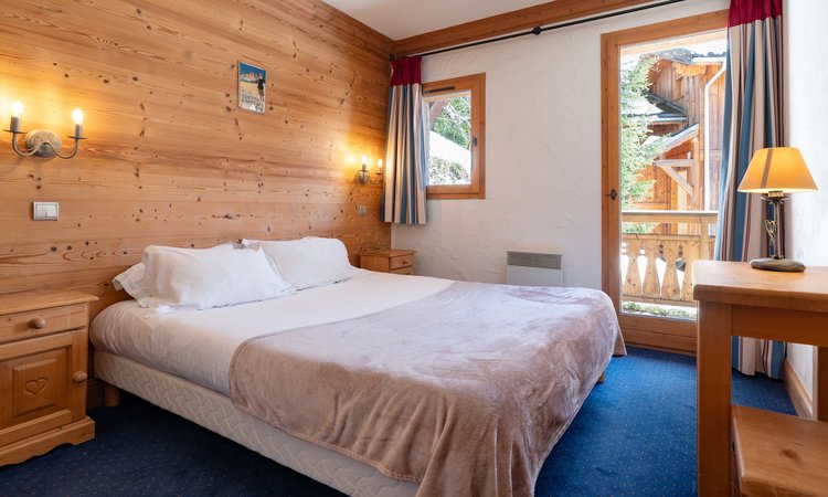 The Double bedroom in Chalet Oxalys Meribel The Double bedroom in Chalet Oxalys Meribel