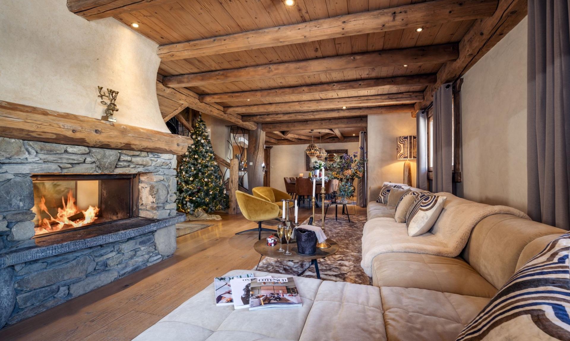 The comfortable Living area with fireplace in Chalet Cheval Blanc Meribel Le Raffort The comfortable Living area with fireplace in Chalet Cheval Blanc Meribel Le Raffort