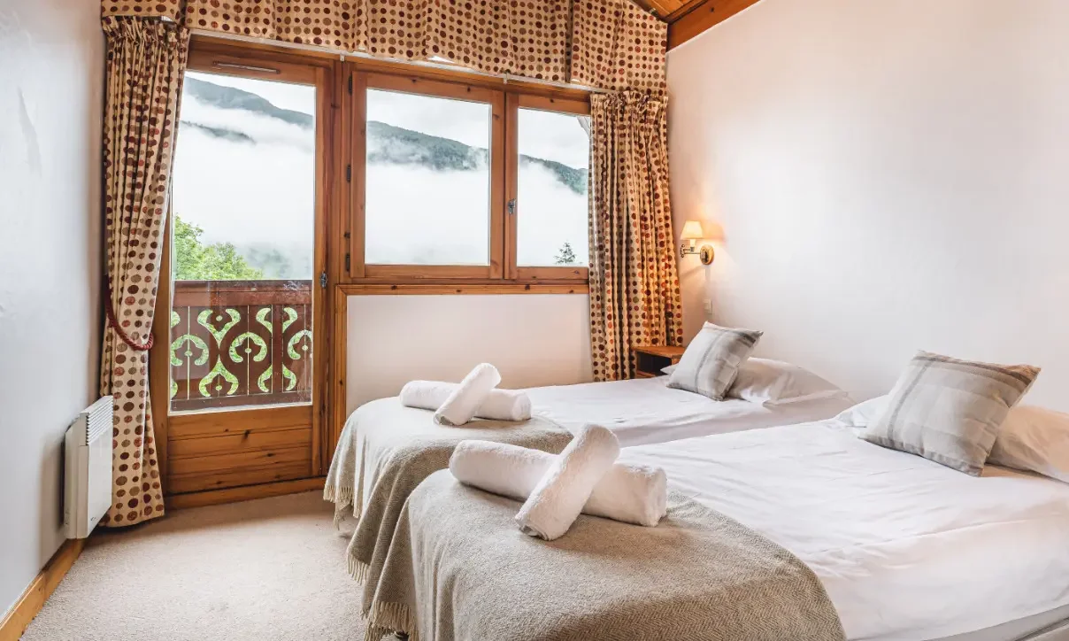 A comfortable bedroom in Chalet Virage Meribel Centre A comfortable bedroom in Chalet Virage Meribel Centre