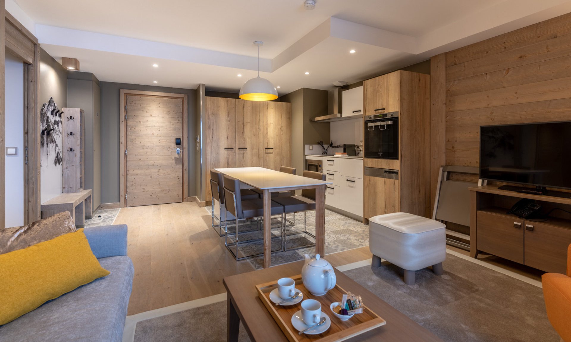 The Living, dining and kitchen areain a 4 person aparment in Residence L'Hevana Meribel The Living, dining and kitchen areain a 4 person aparment in Residence L'Hevana Meribel