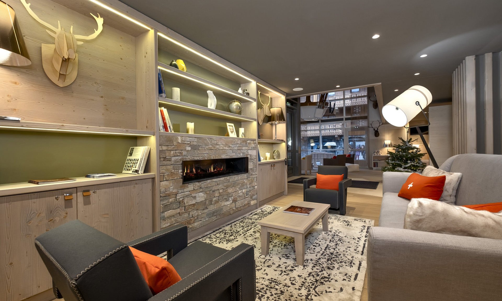 The Lounge area with a fireplace in one of the Apartments in Residence L'Hevana Meribel The Lounge area with a fireplace in one of the Apartments in Residence L'Hevana Meribel