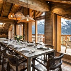 A large Dining area in Residence Falcon Lodge Meribel