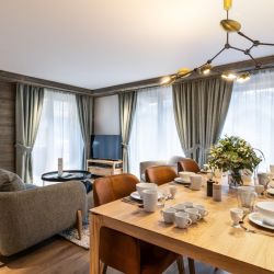 The Living and dining area in one of the apartments in Residence Falcon Lodge Meribel