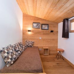 A bedroom in Chalet Arbe Meribel Village