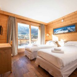 On of the comfortable Bedrooms in Chalet L'Ancolie Meribel