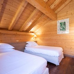 A comfortable Bedroom in Chalet L'Ancolie Meribel