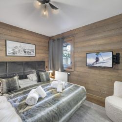 One of the bedrooms in Apartment Parc Alpin 302 Meribel