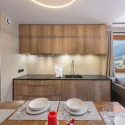 The Kitchen and dining area in Apartment Arolaz 15 Meribel