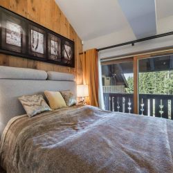 A Double bedroom in Apartment Aspen Park 61 Meribel