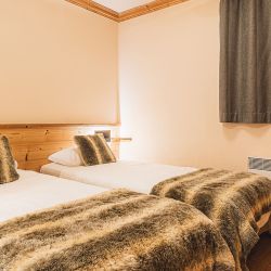 A Twin Bedroom in Chalet Jakub Val Thorens