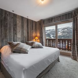 A spcaious bedroom in Apartment Aspen Park 52 Meribel