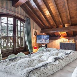 One of the comfortable Bedrooms in Chalet Colorado Meribel