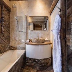 One of the lovely bathrooms in Catered Chalet Cheval Blanc Meribel Le Raffort