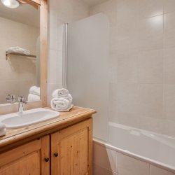A Bathroom in Catered Chalet Sabot Penthouse in Val Thorens