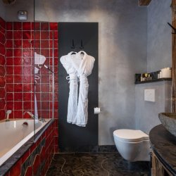 One of the bathrooms in Catered Chalet Cheval Blanc Meribel Le Raffort