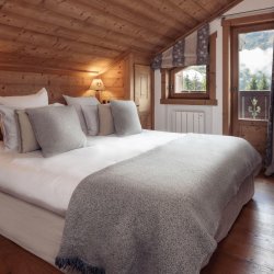 One of the bedrooms in Chalet Trois Ours Meribel Centre