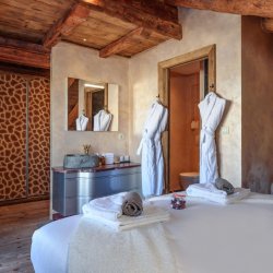 The double bedroom with an extra bed in Catered Chalet Cheval Blanc Meribel Le Raffort