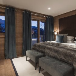 A bedroom in Chalet Le Grenier in Meribel Centre
