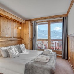 A Double bedroom in Catered Chalet Bonhomme in Val Thorens