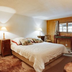 One of the bedrooms in Apartment Petaru in Meribel Centre