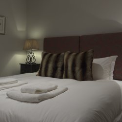 A comfy bedroom in Chalet Montana in Meribel Centre