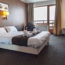 A Family Room with balcony in Hotel Le Montana in La Tania