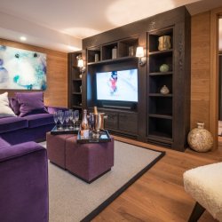 The TV and games room in Chalet Le Grenier Meribel Centre