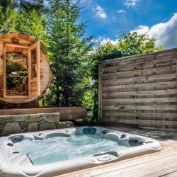 The outdoor Hot Tub & Sauna at Chalet Brioche in Meribel