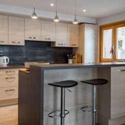 The modern and fully equipped kitchen in Chalet Montana in Meribel Centre