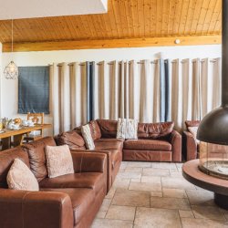 The spacious living and dining area in Chalet Virage Meribel Centre