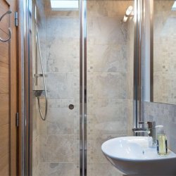 A Shower room in Chalet Montana in Meribel Centre