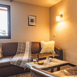 The living area in Chalet Capricorne in Val Thorens