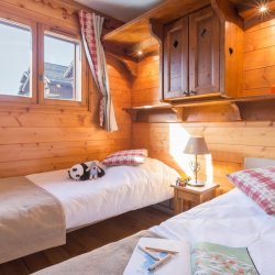 A Twin bedroom in Chalet des Neiges Hermine Val Thorens