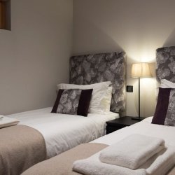 A Twin bedroom in Chalet Montana in Meribel Centre