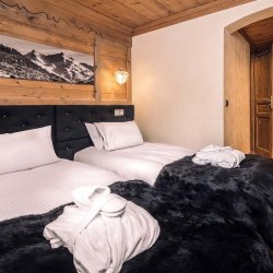 A Twin bedroom in Chalet Mariefleur in Meribel