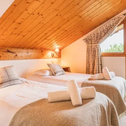 One of the twin bedrooms in Chalet Virage in Meribel Centre