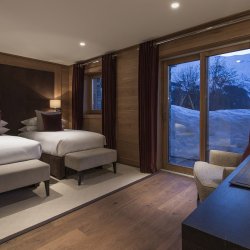 A Twin bedroom in Chalet Le Grenier in Meribel Centre