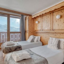 One of the Twin bedrooms in Catered Chalet Bonhomme Val Thorens