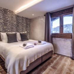 One annexe bedrooms in Catered Chalet Cheval Blanc Meribel Le Raffort