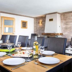 The Dining and living area in one of the large apartments of Chalet des Neiges Hermine Val Thorens