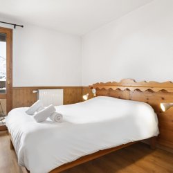 A Double bedroom in the Les Balcons de Val Thorens Apartments