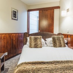 The Double bedroom in Catered Chalet Capricorne in Val Thorens