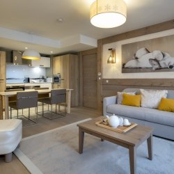 The Living, dining and kitchen area in a 4 person aparment in Residence L'Hevana Meribel