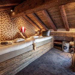The mezzanine area with childrens beds in Chalet Cheval Blanc Meribel Le Raffort