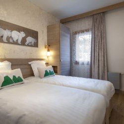 A comfortable Twin bedroom in Residence L'Hevana Meribel