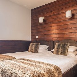 One of the twin bedrooms in Chalet Libra Val Thorens