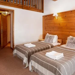 One of the bedrooms in Catered Chalet Pierre Meribel Mottaret